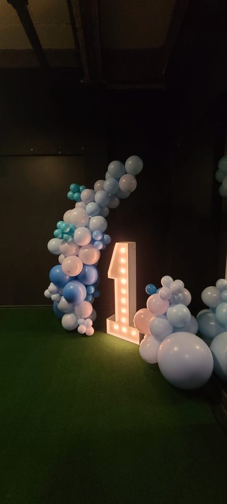 Gravenhurst event decor including marquee numbers and balloon garlands