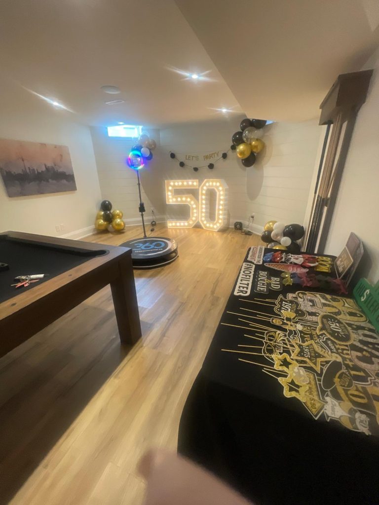 Muskoka 360 video booth with marquee letters and balloon decor